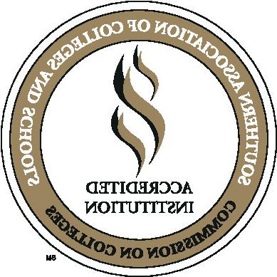 Three golden, angled, wavy lines representing a torch with the stacked words Accredited Institution in black, capitalized letters centered below it on a white circle. A golden ring lies just inside the outer edge of the circle with the words Southern Association of Colleges and Schools in white, capitalized letters on the upper 3/4s and the words Commission on Colleges in black, capitalized letters on the lower 1/4.